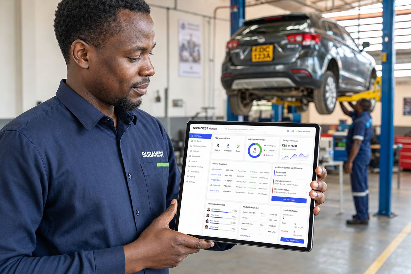 A mechanic updating a job card on the VortexERP Lite garage management system