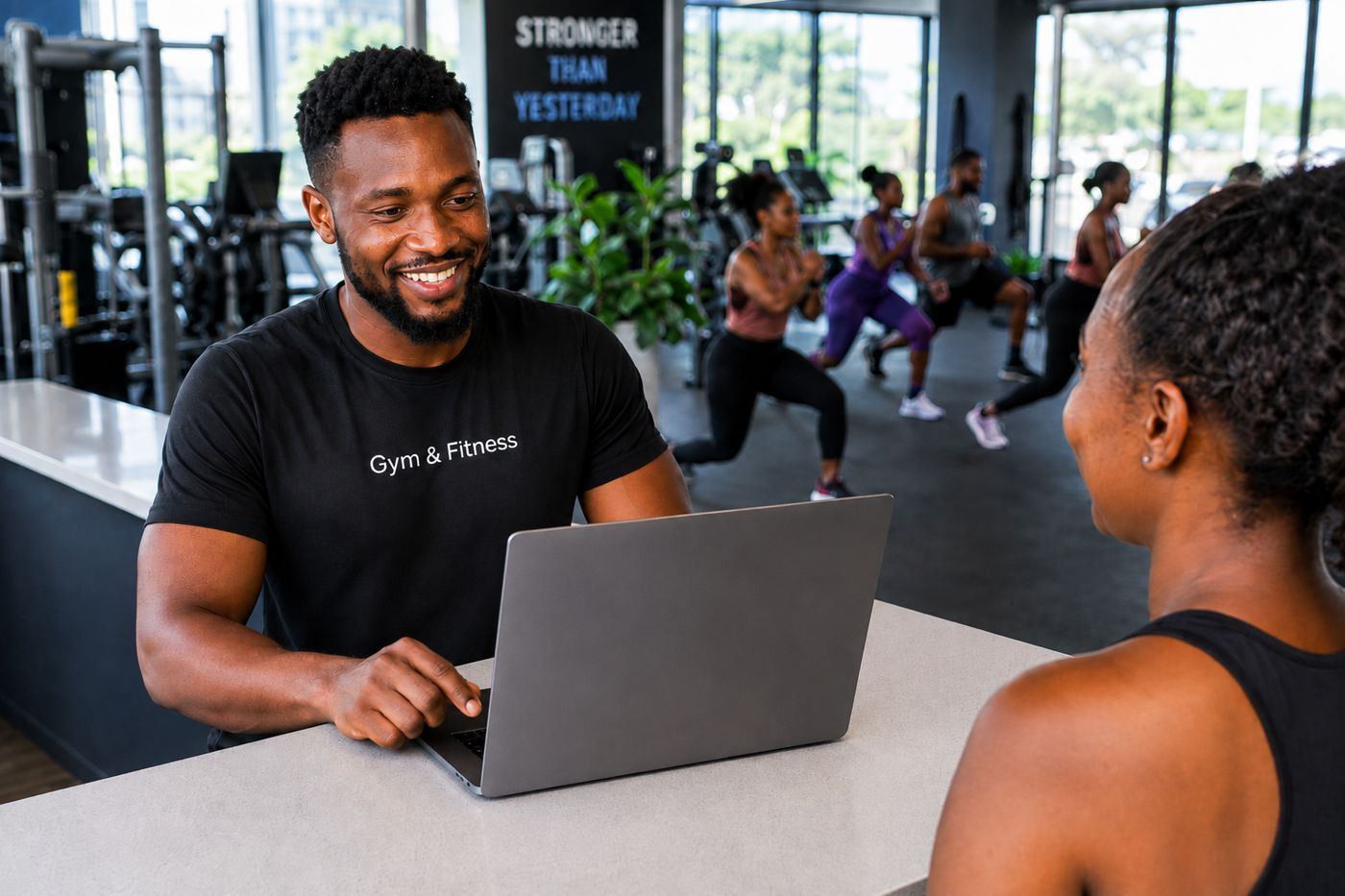 A gym owner checking members in on the VortexERP Lite gym management dashboard